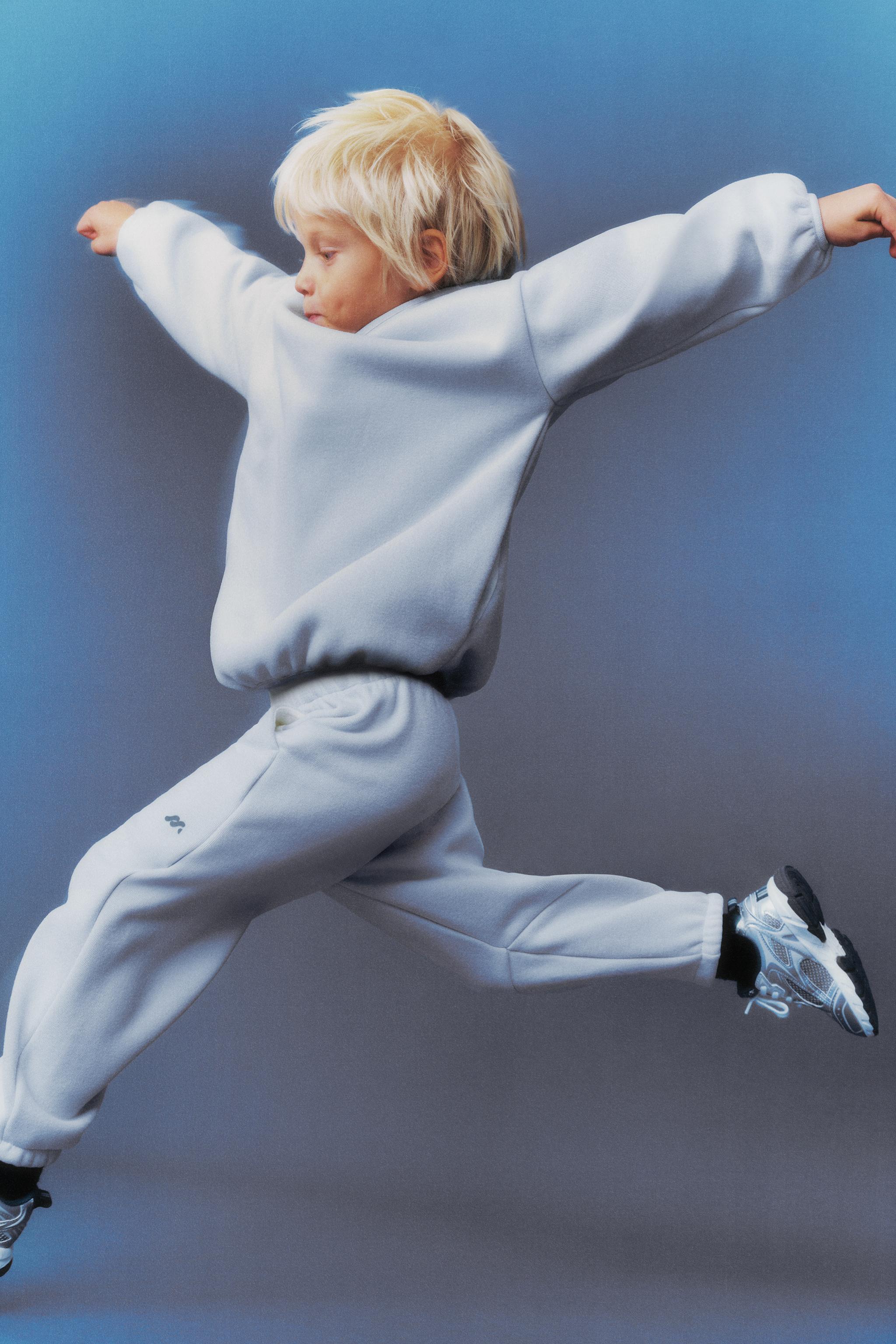 FLEECE LINED BAGGY PANTS WITH LOGO